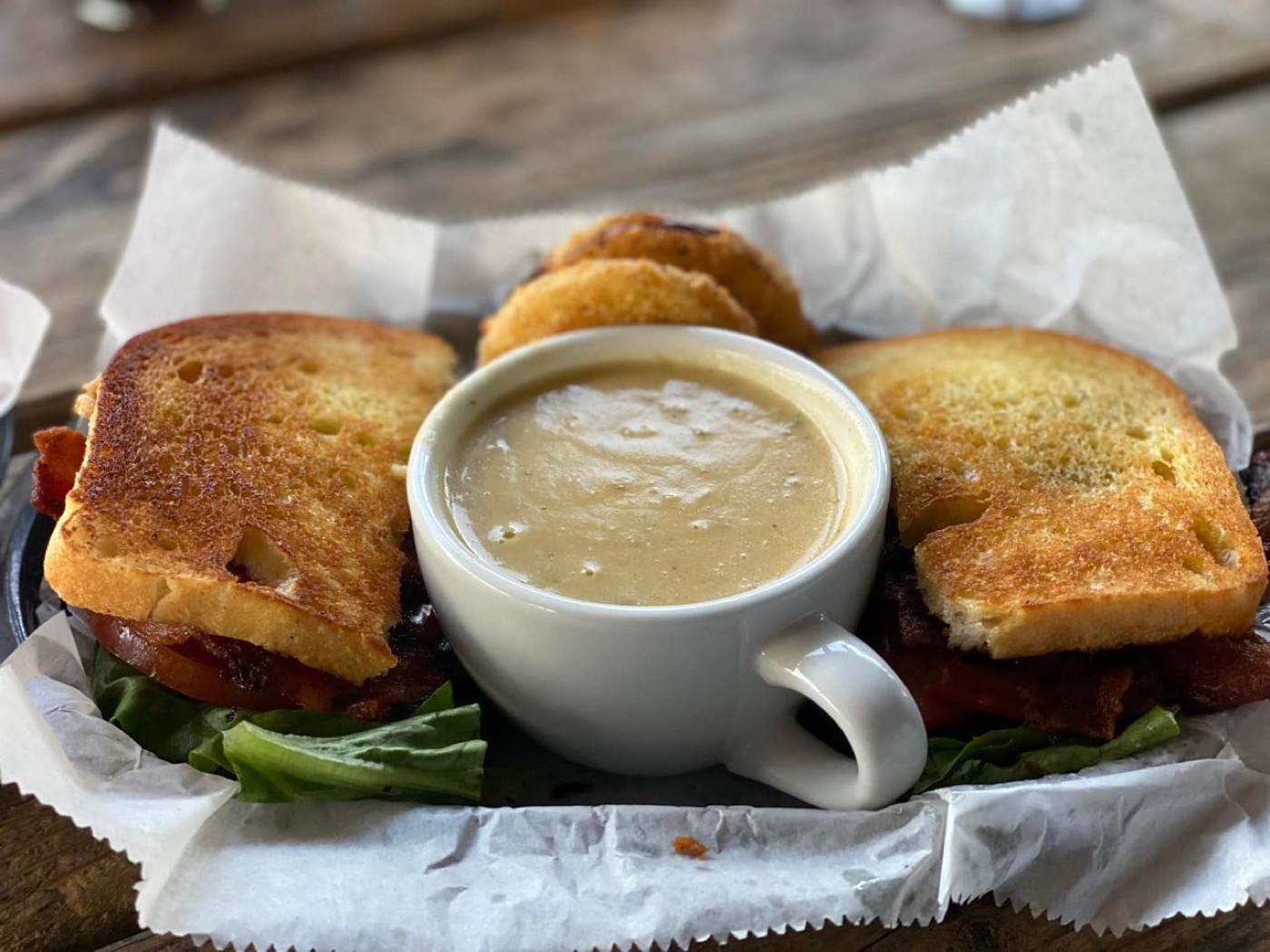 Toasted sandwich with a cup of soup